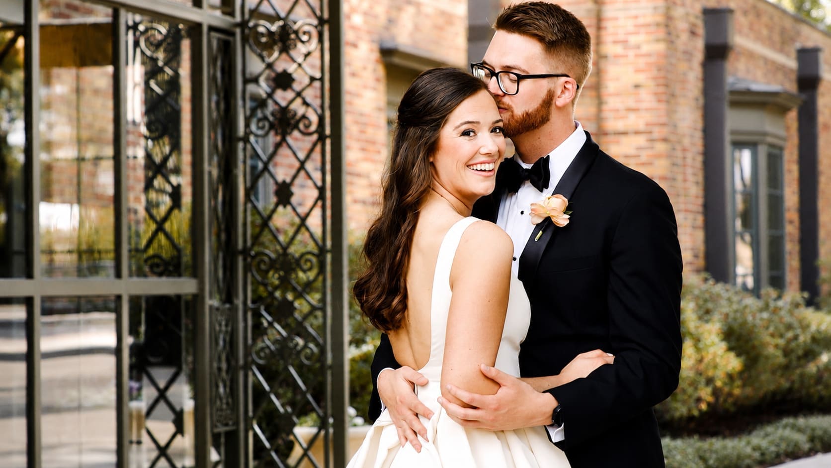 Wedding couple at a classic venue — intimate, quiet, classy