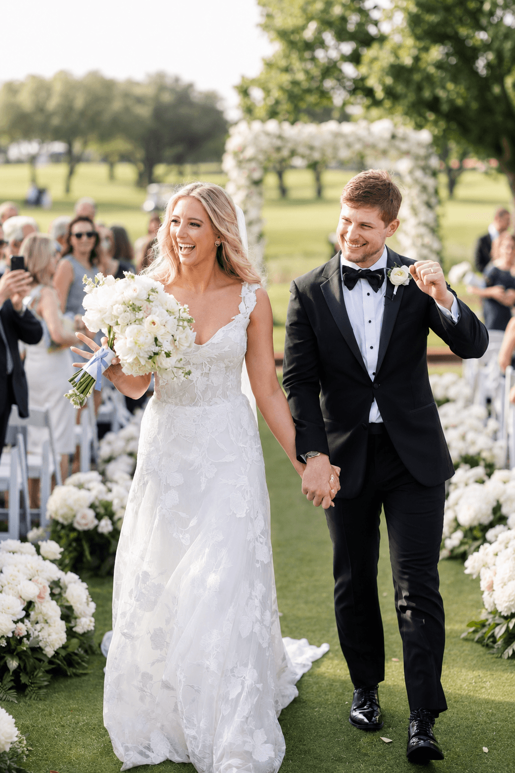 Joyful couple after ceremony recessional